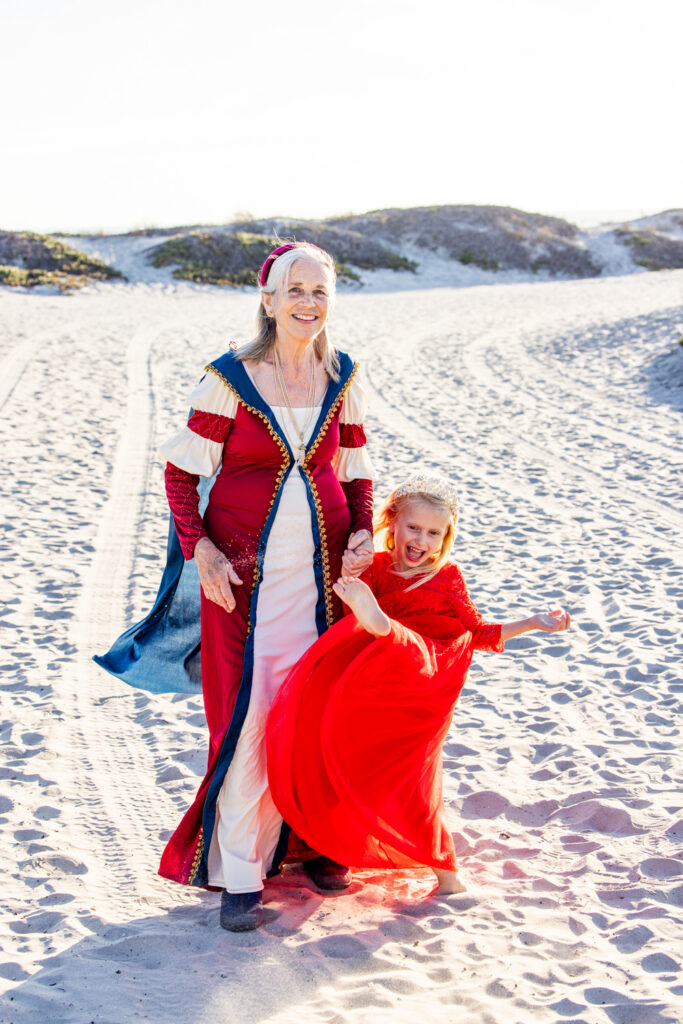 A Family Photographer Coronado Session: The Sequel Portrait showcasing medieval-inspired clothing during a Coronado Beach family session
